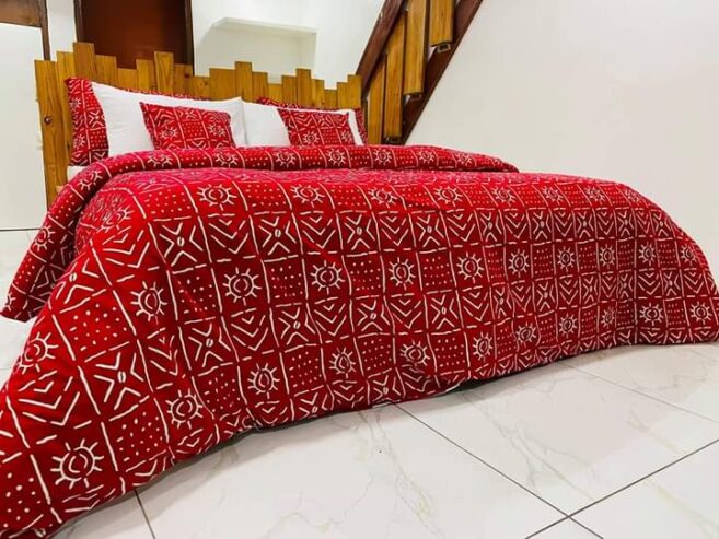 Housse de couette,drap oreillers, rideaux en pagne
